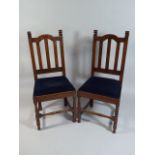 A Pair of Edwardian Oak Framed Side Chairs