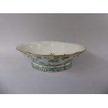 An Oriental Oval and Lobed Bowl Decorated with Birds, Insects and Flowers.