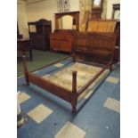 An Edwardian Oak Linen Fold Three Quarter Bed Frame with Iron Runners.