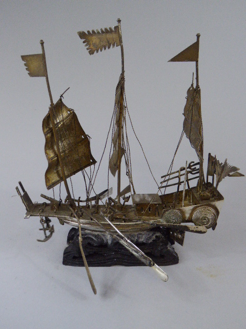 A Chinese White Metal Model of a Sailing Junk. 15.