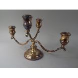 A Silver Decorative Four Branch Candelabra. Birmingham Hallmark and with Adjustable Scrolling Arms.