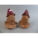 A Pair of Unusual Terracotta Novelty Pin Cushions In the Form of Baby Clowns,