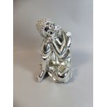 A Modern Silvered Study of a Seated Buddha In Repose,
