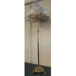 A Good Quality Edwardian Brass Standard Lamp on Circular Base with Three Feet