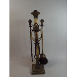 A Good Quality Late Victorian/Edwardian Brass Companion Set,