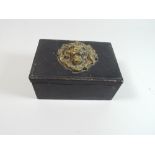 A Hide Covered Rectangular Box Mounted with Brass Lion Mask,