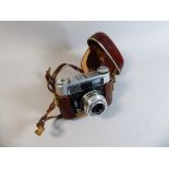 A Vintage Voigtlander Camera In Leather Case