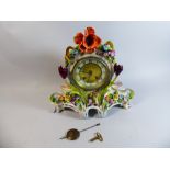 A Continental Porcelain Mantle Clock Decorated with Flowers,