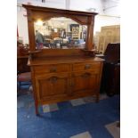 A Nice Quality Arts and Crafts Oak Mirror Back Sideboard with Two Drawers Over Cupboard Base Having