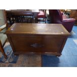 An Oak Lift Top Coffer Chest on Casters,