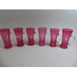 A Collection of Six Overlaid Cranberry Glass Tankards,
