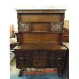 An Oak Dining Room Side Board with Centre Drawers