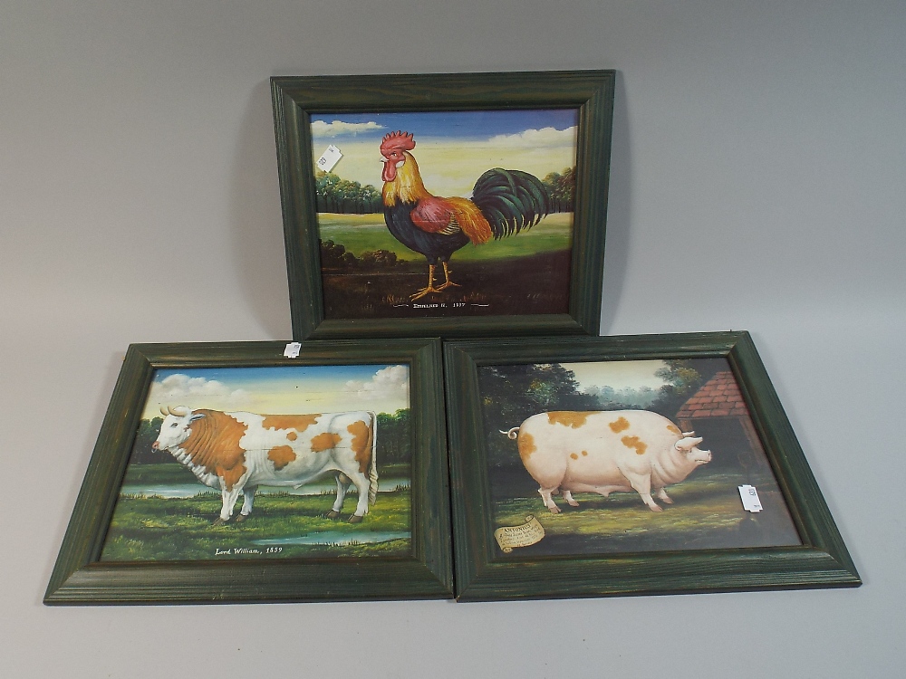 A Set of Three Framed Reproduction Animal Prints