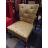 An Upholstered Nursing Chair on Short Cabriole Supports,