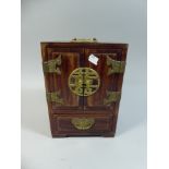 An Oriental Brass Mounted Collectors Cabinet with Panelled Doors to Three Inner Drawers and Single