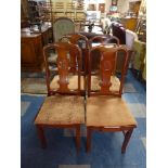 A Set of Four Oriental Style Dining Chairs