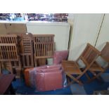 A Garden Patio Set Comprising Octagonal Table and Four Folding Chairs with Cushions