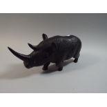 A Carved African Study of a Rhino,