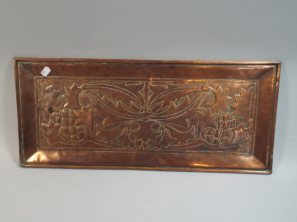 An Arts and Crafts Beaten Copper Panel Decorated with Thistles,