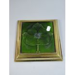 An Art Nouveau Tile Set in Stepped Brass Stand,