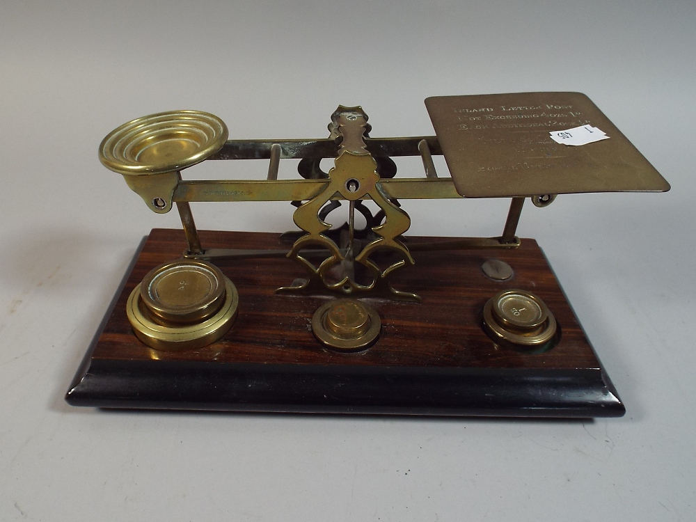A Set of Mordan Postage Scales with Weights on Stepped Wooden Plinth,
