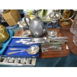 A Tray of Metal Wares to Include Two Silver Plated Candelabra, Cutlery,