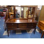 A Stag Dressing Table with Six Short Drawers,