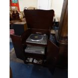 A Mahogany Cabinet Containing Hitachi HT 50S and Amp,