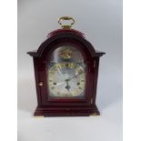 A Modern Mahogany Cased German Bracket Clock with Brass Carrying Handle,