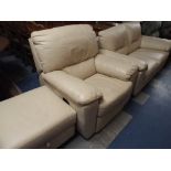 A Cream Leather Three Piece Suite Comprising Two Seater Settee,