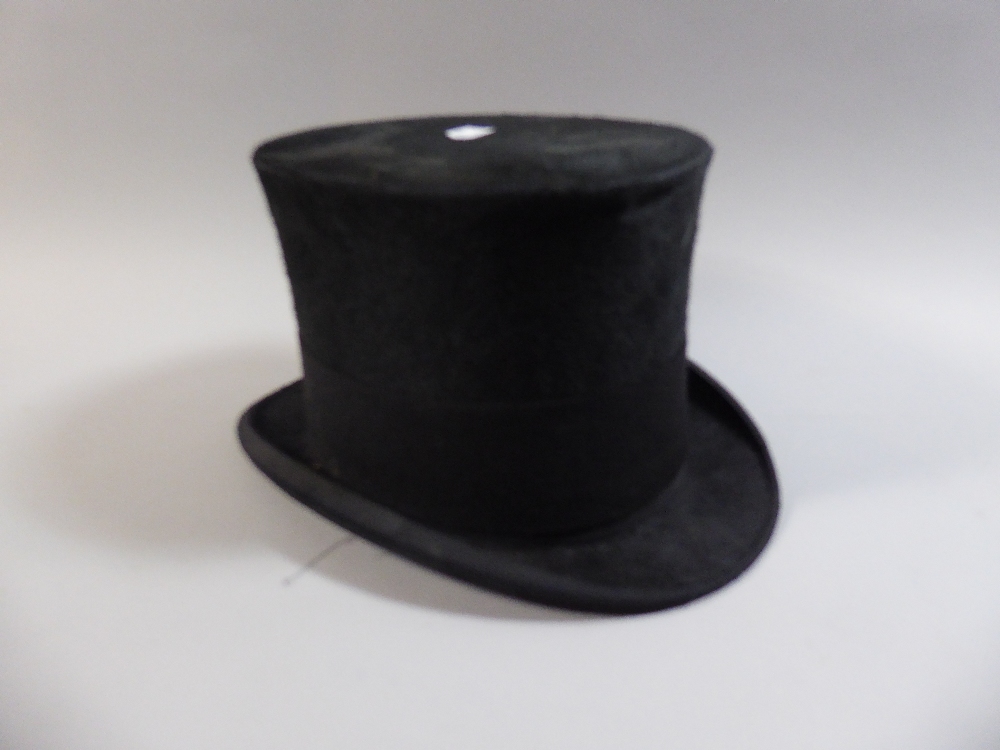 A Silk Top Hat, Inner Measurements 19cmx15.