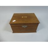 An Edwardian Inlaid Mahogany Workbox,