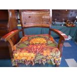 A Vintage Cane Backed Child's Arm Chair,