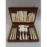 An Edwardian Oak Canteen of Silver Plated and Bone Handled Cutlery