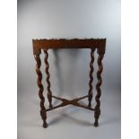 An Edwardian Oak Rectangular Topped Side Table with Barley Twist Supports,