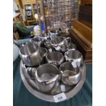 A Collection of Old Hall Stainless Steel Cream Jugs and Sugar Bowls