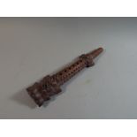 A Carved Indian Wooden Flute,