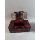 A Lacquered Oriental Musical Jewellery Box with Various Fitted Compartments and Hinged Lid,