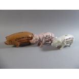 A Set of Three Cast Metal Novelty Money Banks in the Form of American Pigs,