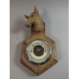 A Mid 20th Century Black Forest Carved Wooded Aneroid Wall Barometer with Stag Mount,