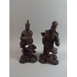 A Pair of Oriental Carved Wooden Studies of Immortals,