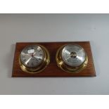 A Reproduction Glass Ships Clock and Barometer Set on Wooden Wall Hanging Plinth,