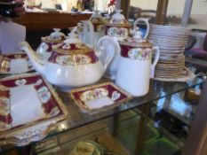 A Quantity of Royal Albert "Lady Hamilton" Porcelain, including eleven teacups, thirteen saucers,