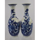A Pair of Antique Chinese Blue and White Vases, depicting birds amongst flowering tree peony and