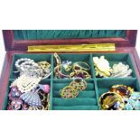 A Box of Costume Jewellery, including necklaces and brooches.