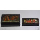 Two Russian Enamel Painted Boxes, depicting various scenes.