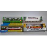 Four Die Cast Haulage Trucks, including 'Eddie Stobart Volvo Fridge Trailer', 'Siku Farm Low