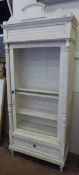 A White Painted Open Front French Armoire, the armoire with three shelves having a drawer to bottom,