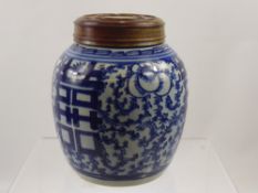 A Chinese Blue and White Ginger Jar, with wooden cover, approx 21 cms