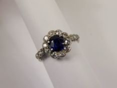 A Lady's Antique Platinum Royal Blue Sapphire and Diamond Ring, the deep royal blue cushion set